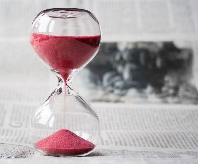 hour glass with red sand